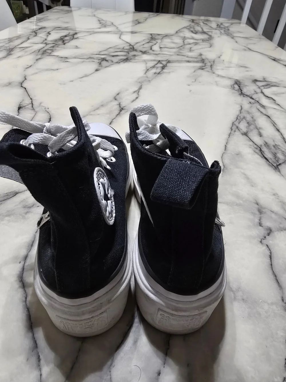Converse Black and White High-Top Sneakers